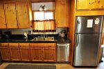 Upgraded Kitchen with stainless and granite